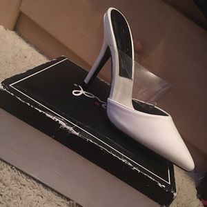 Brand new white with lucite band strapped mules